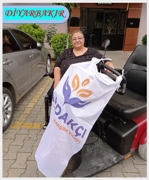 Photos from powered wheelchair distribution events.