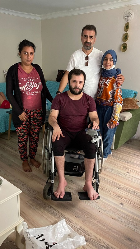 Photos from powered wheelchair distribution events.