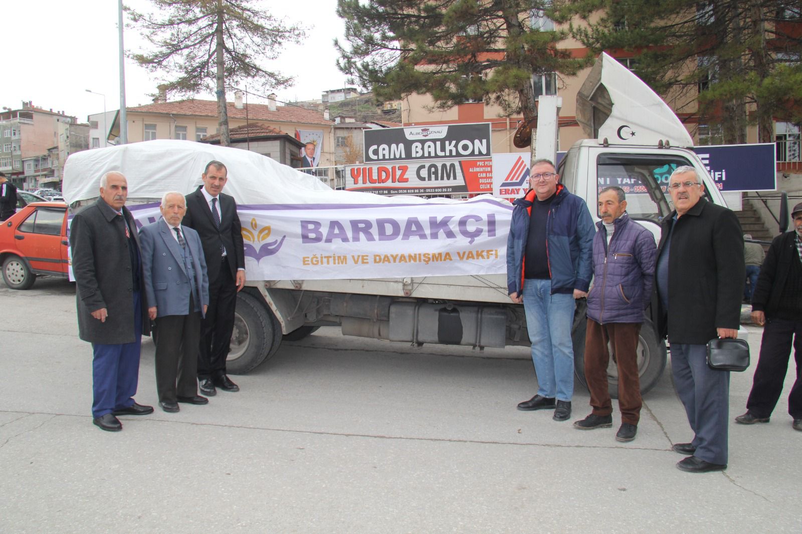 Photos from powered wheelchair distribution events.