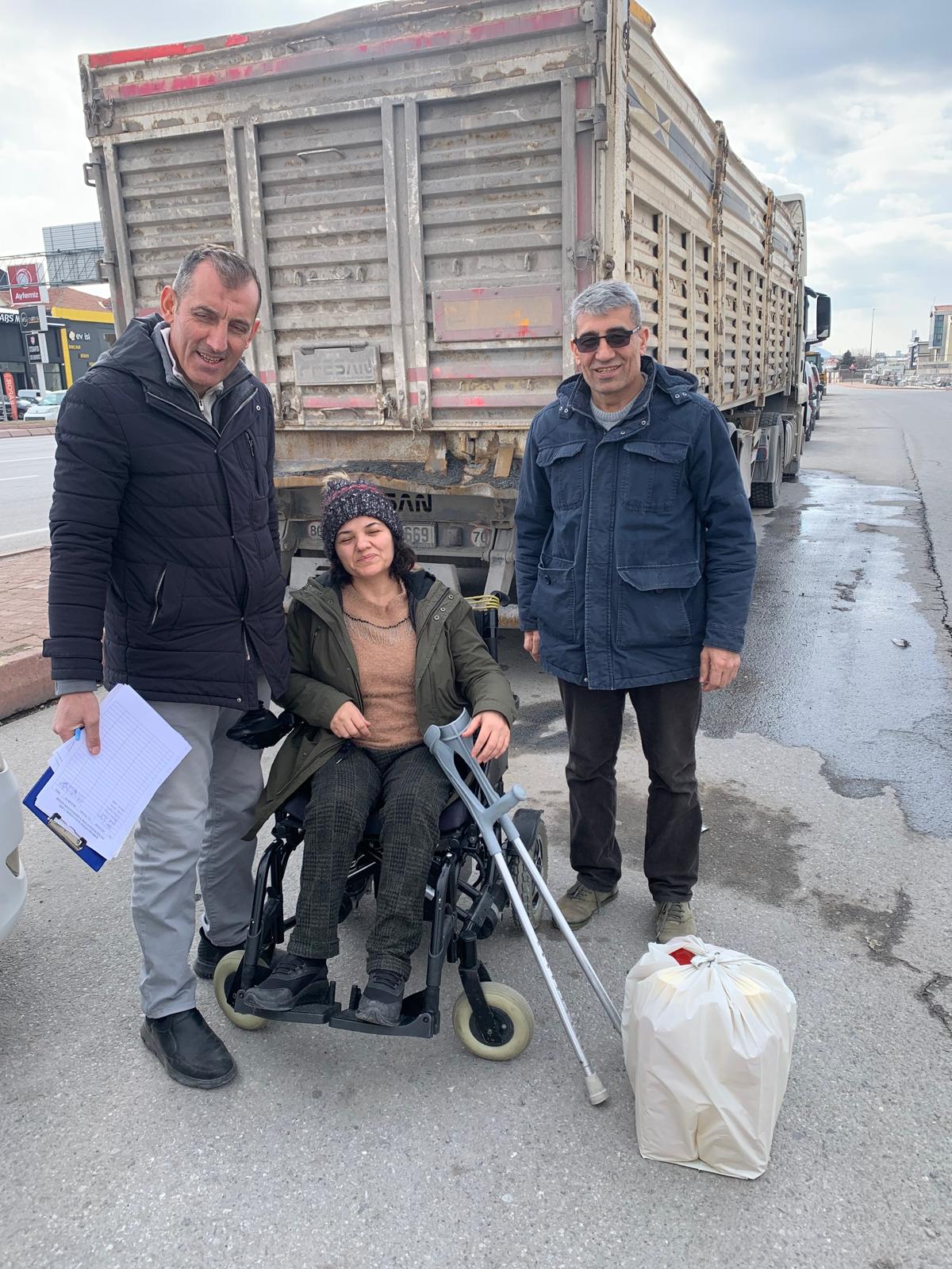 Photos from powered wheelchair distribution events.